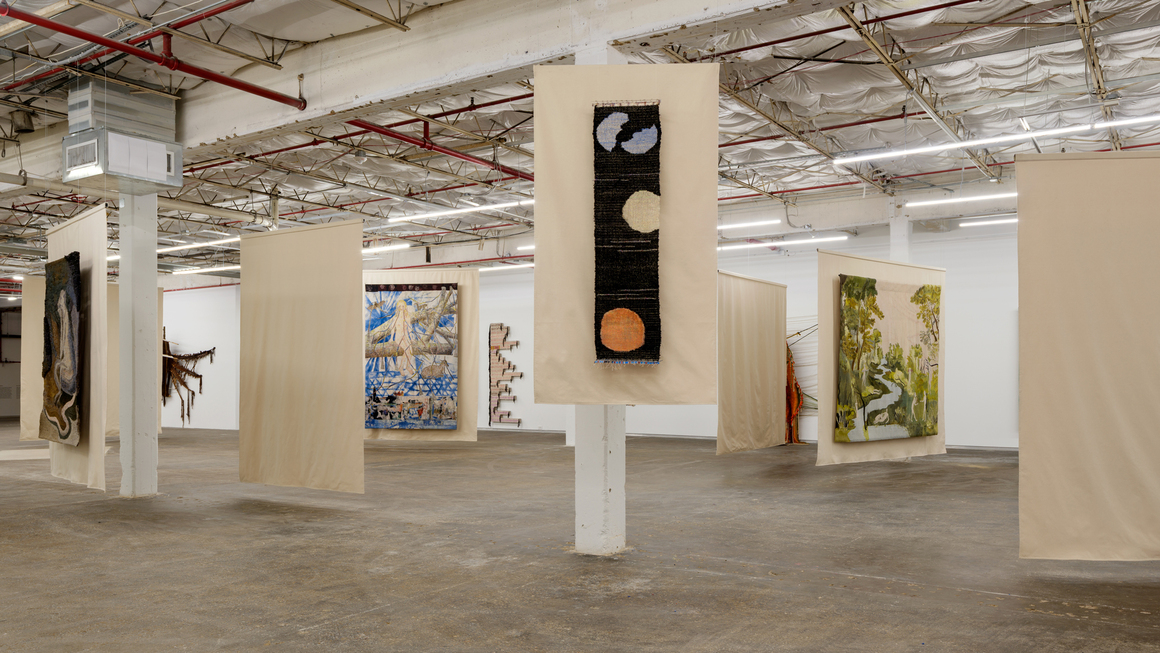 Installation view of <em>You Stretched Diagonally Across It: Contemporary Tapestry</em>, 2025. Dallas Contemporary, Dallas, Texas. Photography by Kevin Todora.